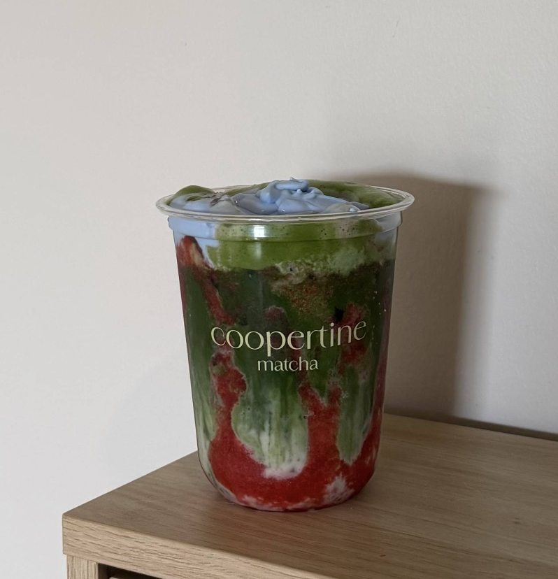 Layered strawberry matcha with blue cloud foam